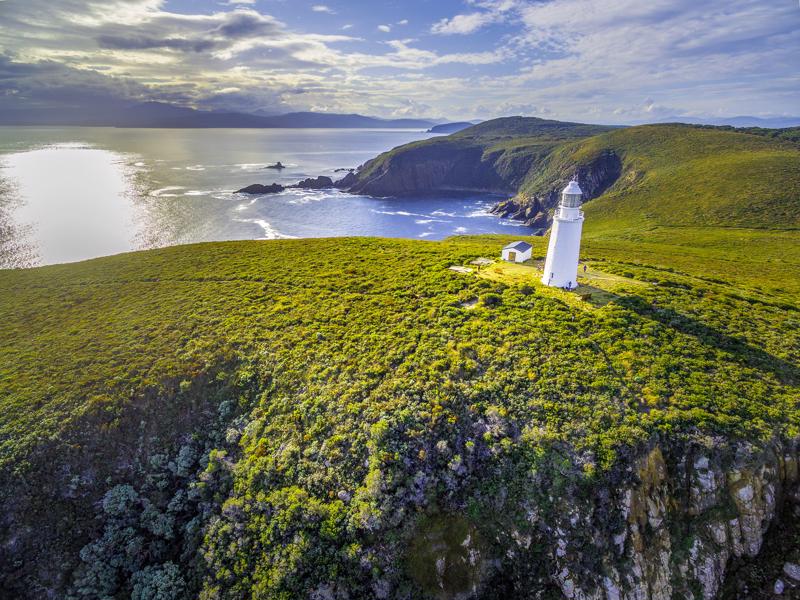 Aerial view of Bruny Island Lighthouse at sunset. Tasmania, Australia