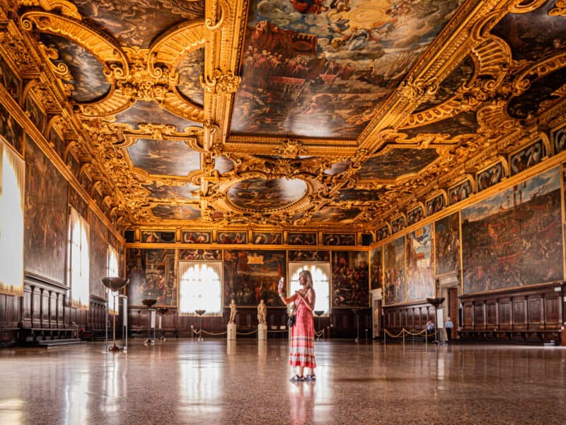 caz standing in middle of empty ballroom