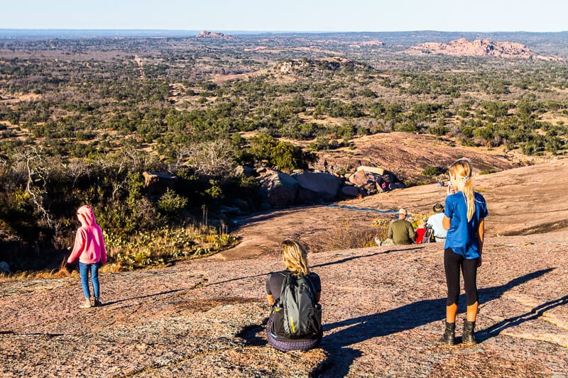 people sitting on rocks