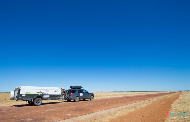 The Savannah Way - Queensland, Australia A car parked on the side of a dirt road