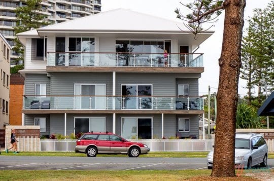 A car parked in front of a house