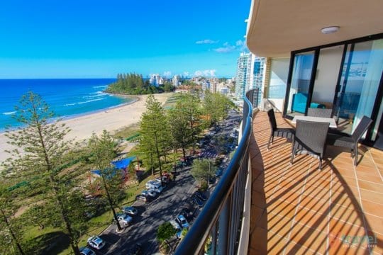 balcony on a building overlooking the beach