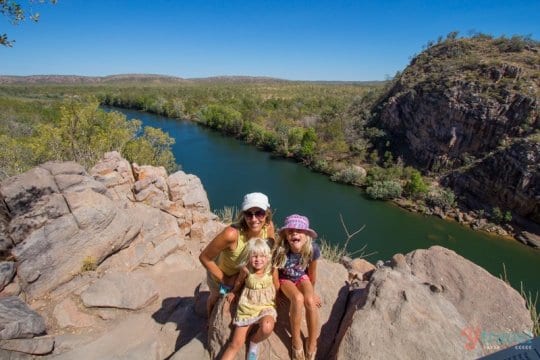 family posing on cliffs overlooking gorge