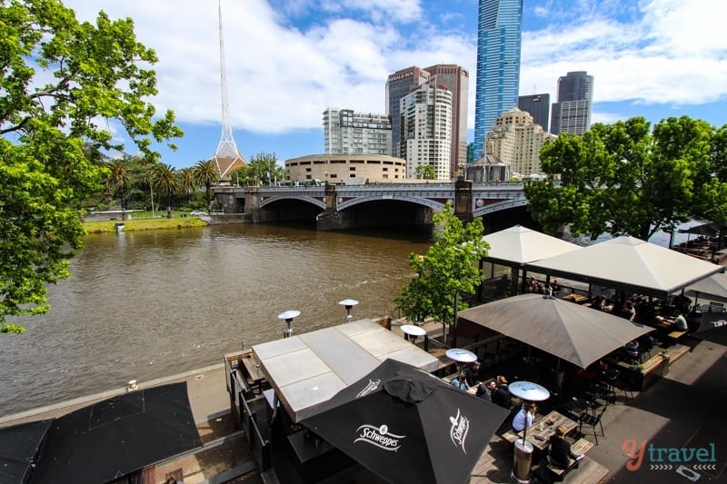 river with city buildings in the background