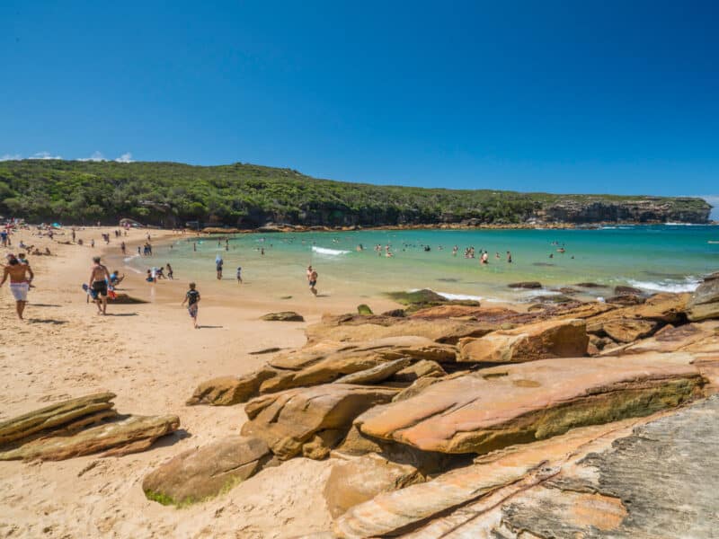 Crowds enjoying Wattamolla Beach in the Royal National Park.