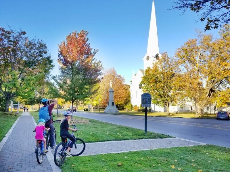 people riding bikes in a park